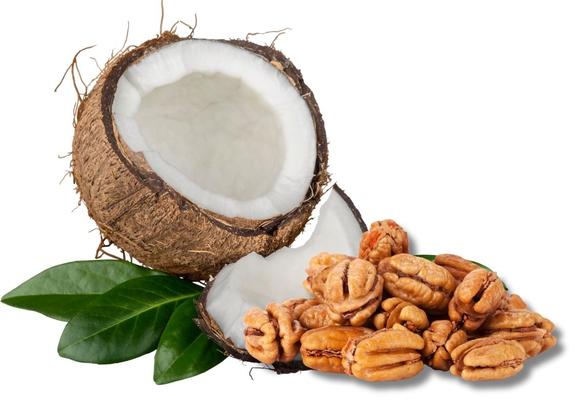 Ingredientes naturales para elaborar coquitos Ricoquitos: coco fresco rallado, nueces, azúcar natural